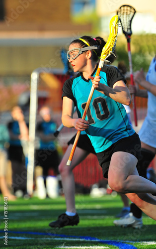 Photos Lacrosse player running