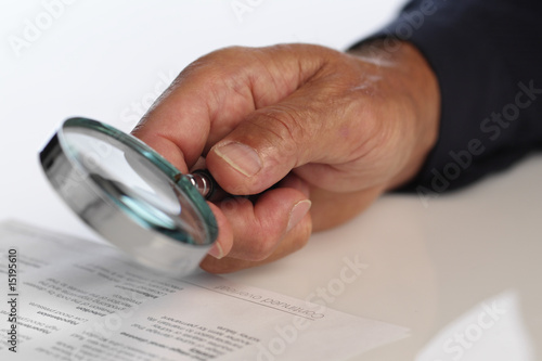 Eldery man check medical papers