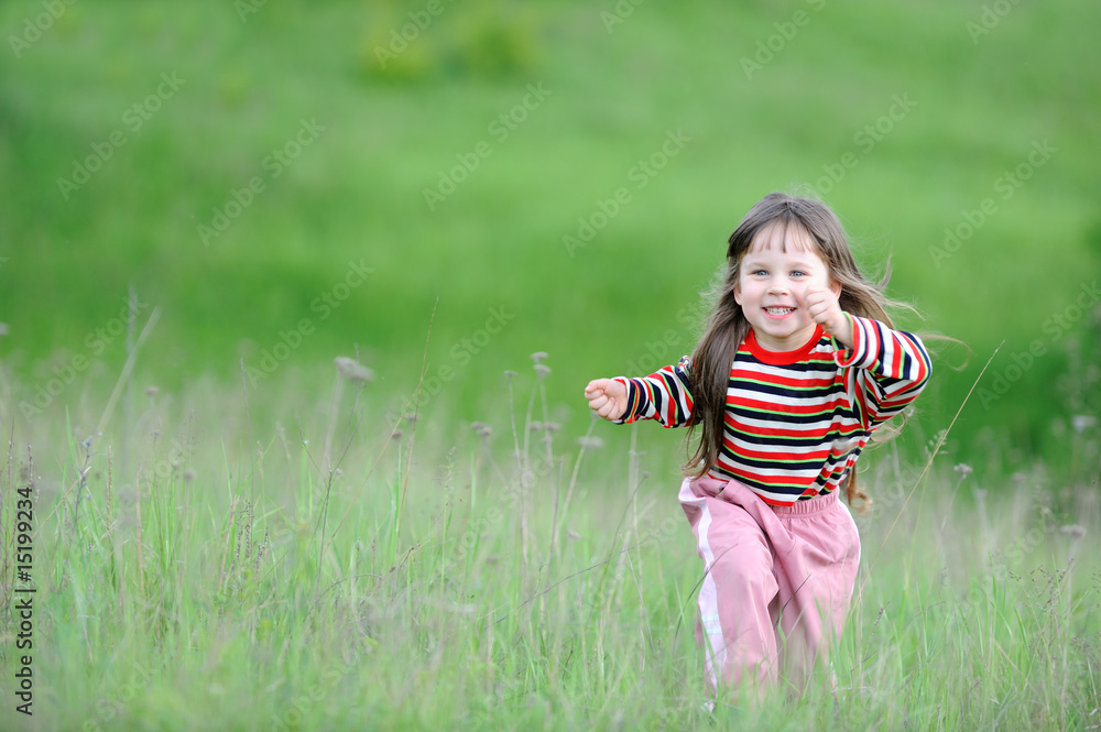 The running girl on a green field The running girl on a green field