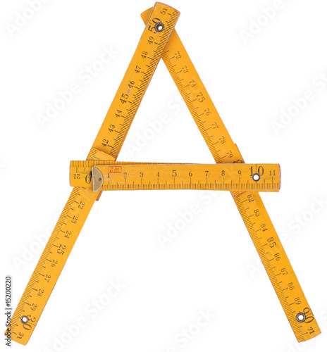 old yellow ruler forming font symbol A