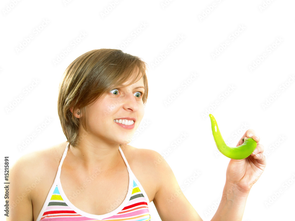 Mad girl with a green chilly pepper