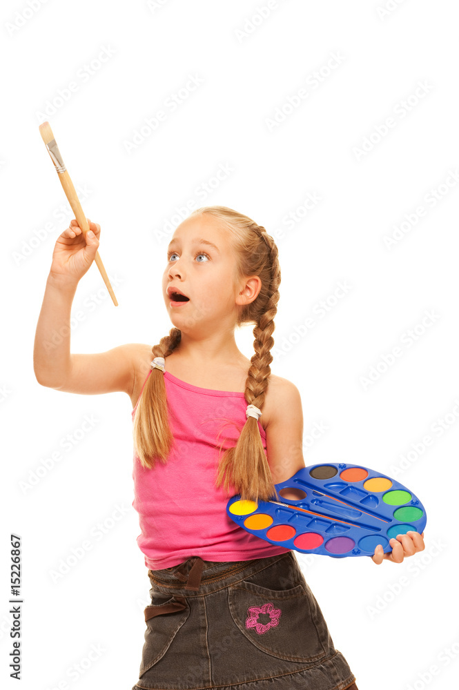 Beautiful little girl with a paintbrush, Isolated on white.... Beautiful little girl with a paintbrush, Isolated on white....