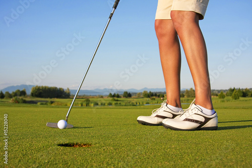Foto Lady golfer putt