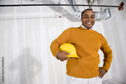 Man in office space ready for buildout photo