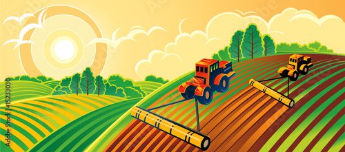 Spring country landscape with two tractors