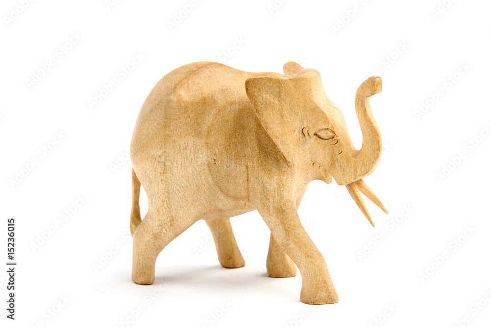 Wooden elephant sculpture isolated on white Wooden elephant sculpture isolated on white