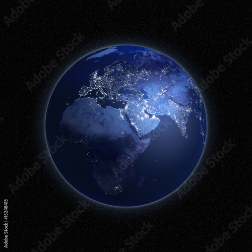 Night view of Earth with lights glowing in urban areas.