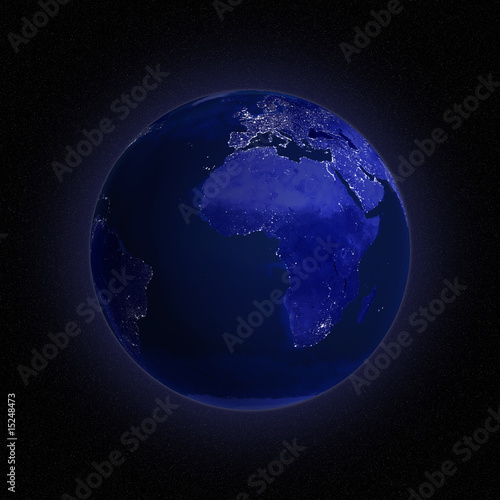 Night view of Earth with lights glowing in urban areas.