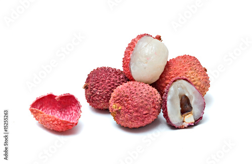 Pile of lychees and  section isolated on white background
