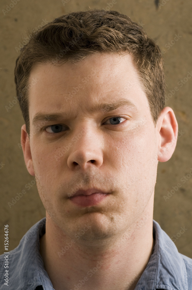Young Male with Serious Expression Young Male with Serious Expression