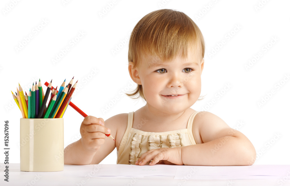 Happy child draw with red crayon Happy child draw with red crayon