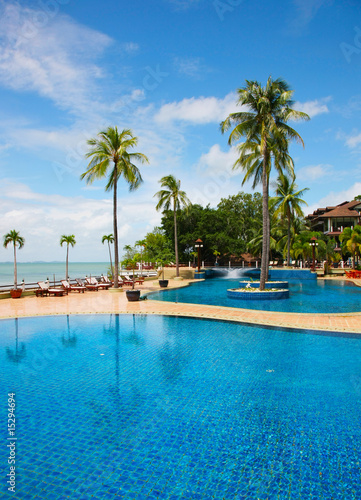 A swimming pool  and resort © GraphicsRF