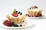Delicious tarts with berries and cream