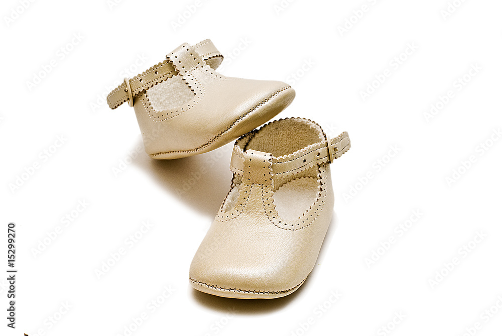 Zapatos de bautizo champagne. Stock Photo | Adobe Stock