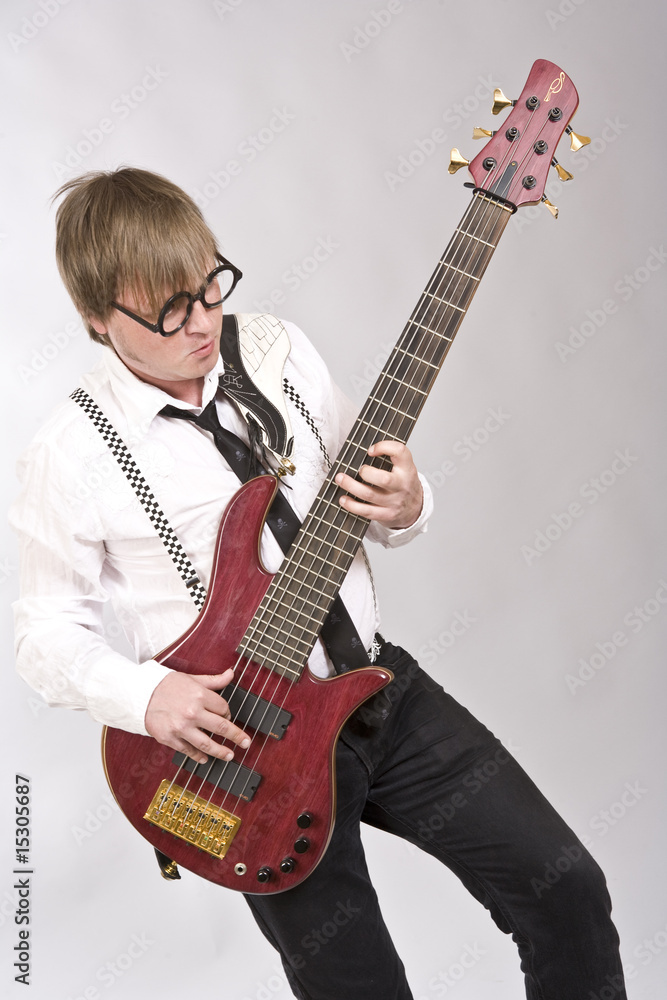 Fototapeta premium Man playing acoustic guitar at rock concert