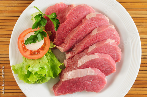 Raw meat and vegetables.