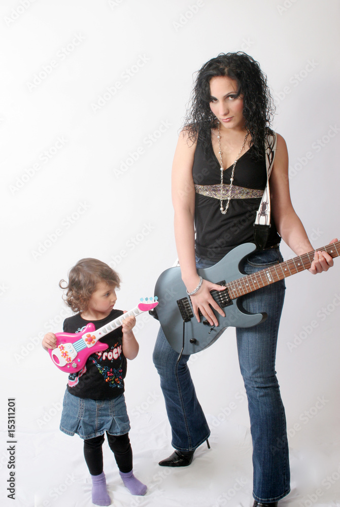 Mother and daughter with guitars Mother and daughter with guitars