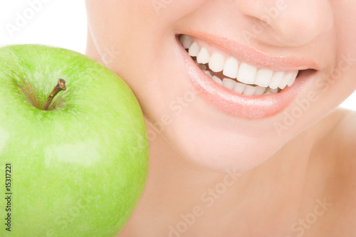 healthy teeth and green apple