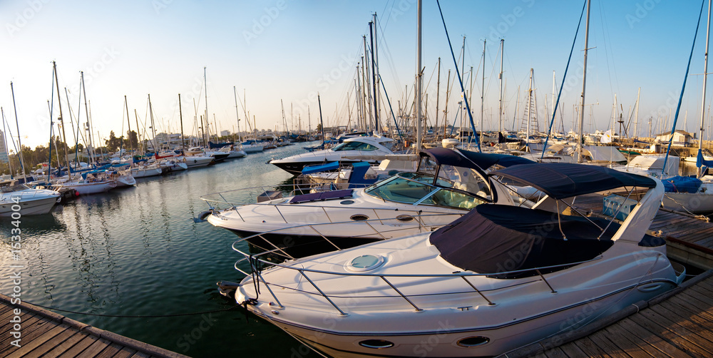 Fototapeta premium series of panoramic images from the harbor with yachts at dusk