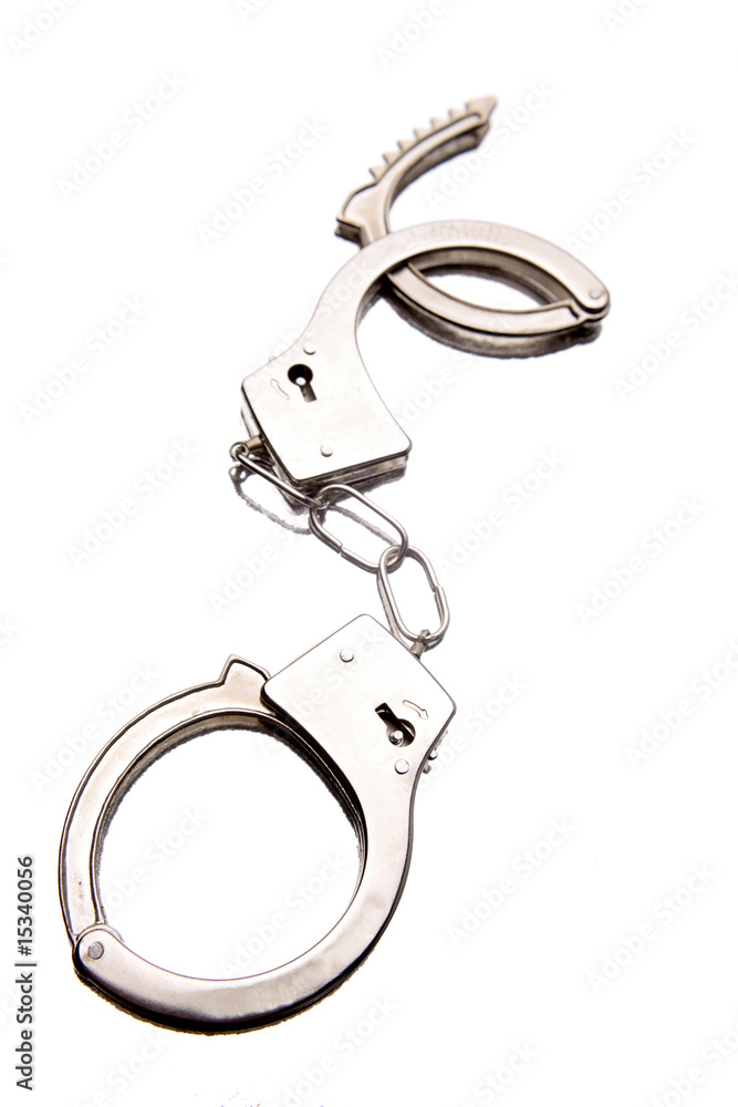 Handcuffs isolated on white background Handcuffs isolated on white background
