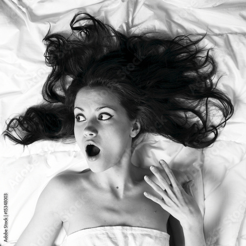 Фотография Young woman with magnificent scattered hair
