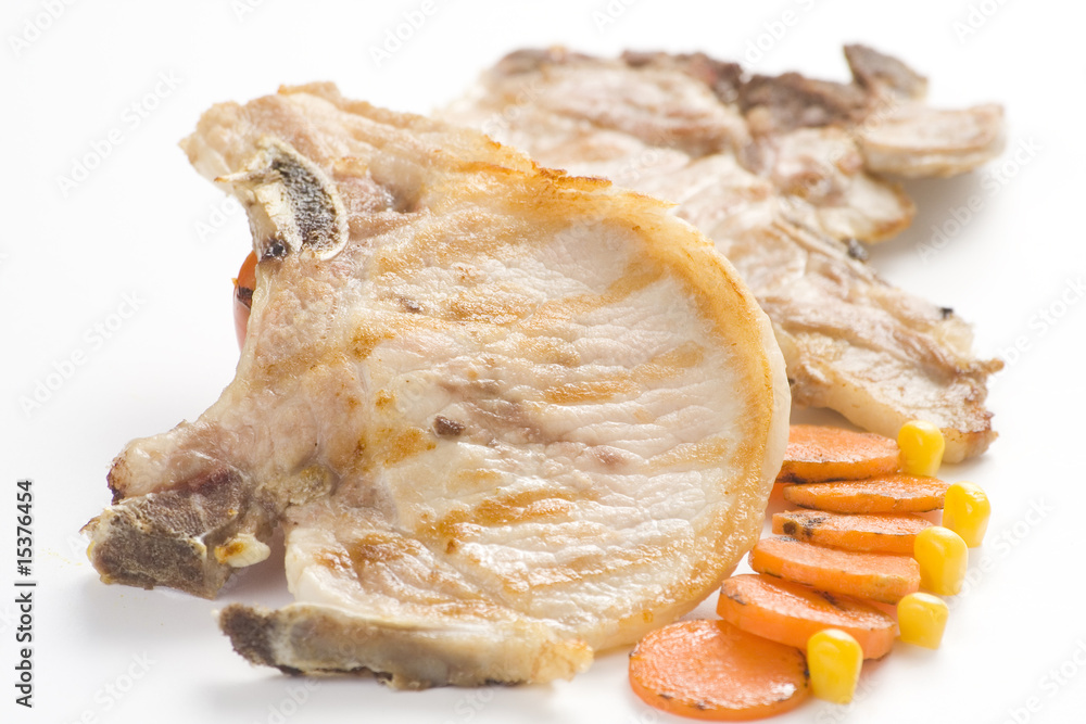 tasty pork chop with corn carrot tomato tasty pork chop with corn carrot tomato