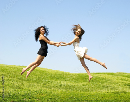 two jumping woman