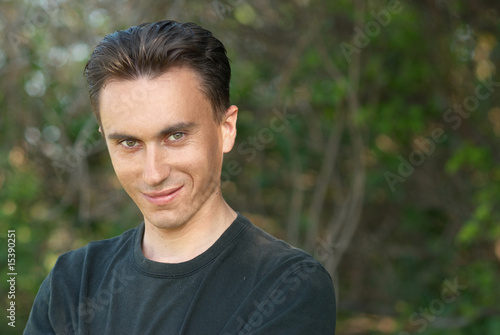 Man's portrait in the forest