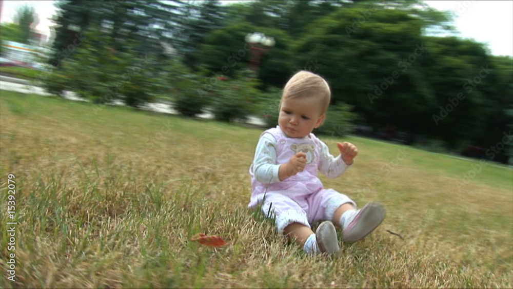 Child keep a cone. Camera flies round it Child keep a cone. Camera flies round it