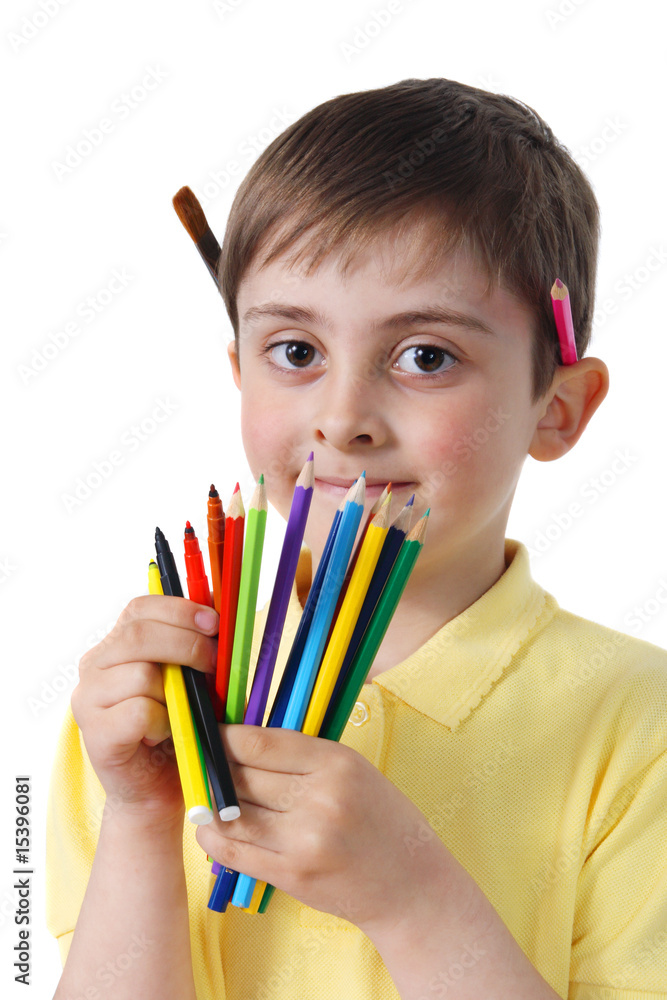 Little boy with crayons on a white background Little boy with crayons on a white background