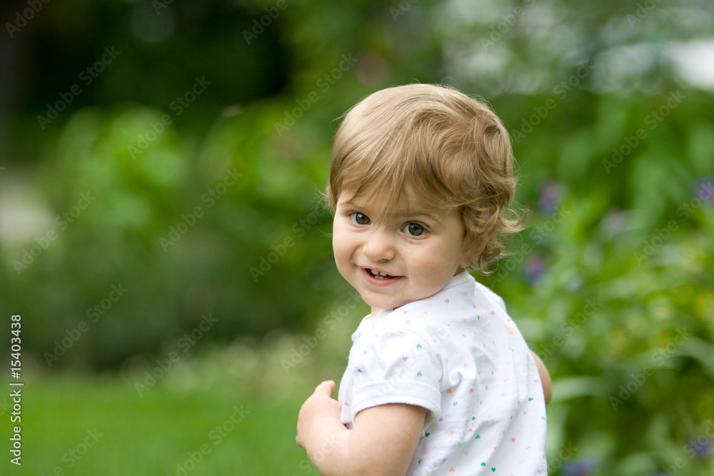 child looking back while outside child looking back while outside
