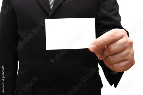 Business man handing a blank business card