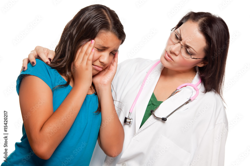 Unhappy Hispanic Girl and Concerned Female Doctor Unhappy Hispanic Girl and Concerned Female Doctor