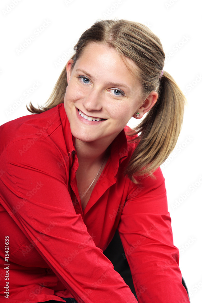 a happy teenage girl smiling with tow blond pony tales a happy teenage girl smiling with tow blond pony tales