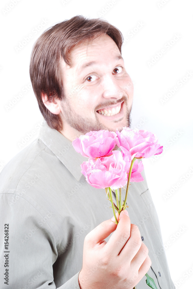 Cute man offering pink roses Cute man offering pink roses