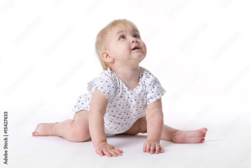 Toddler girl in ballet position looking up Toddler girl in ballet position looking up
