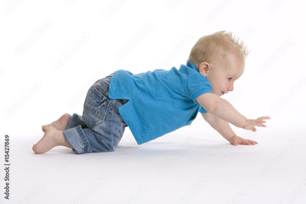 Toddler boy is crawling in a hurry Toddler boy is crawling in a hurry