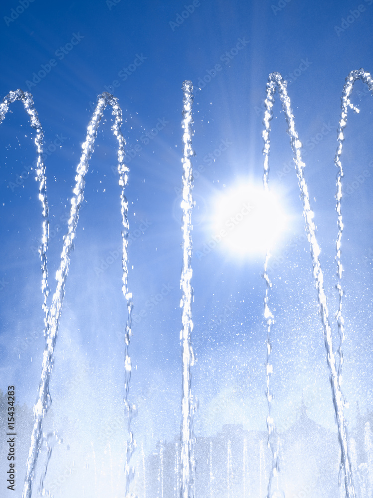 Fountain jets against sunlight Fountain jets against sunlight