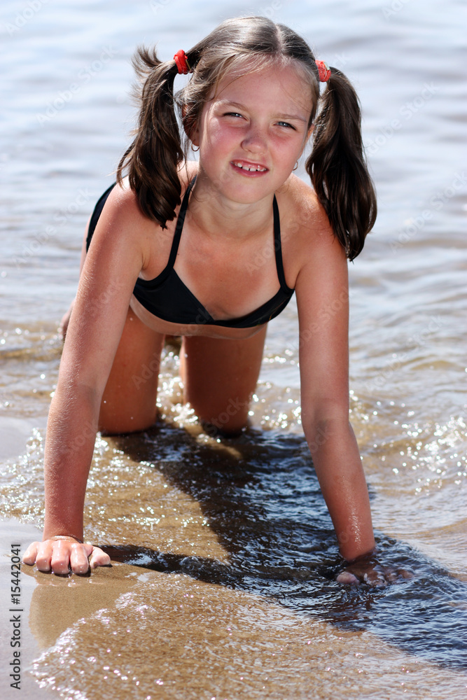 little girl on a beach Stock Photo Adobe Stock