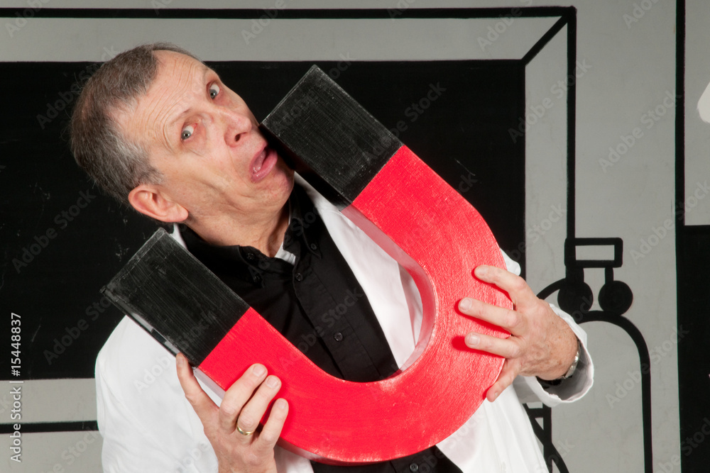 Fotografie Professor is testing magnetism