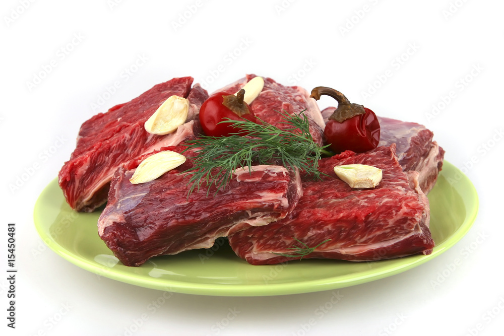 uncooked ribs on dish uncooked ribs on dish