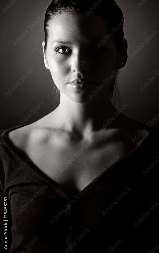 Low Key Black and White Shot of a Beautiful Teenager Low Key Black and White Shot of a Beautiful Teenager