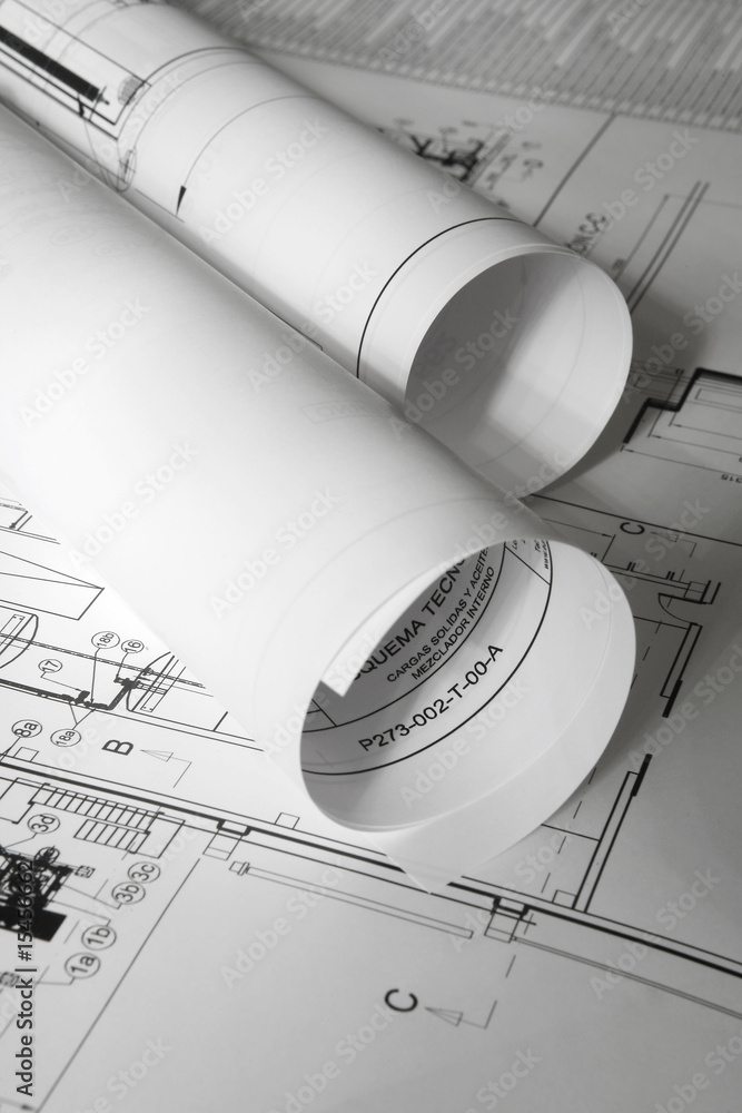 Rolled plans on the table Rolled plans on the table