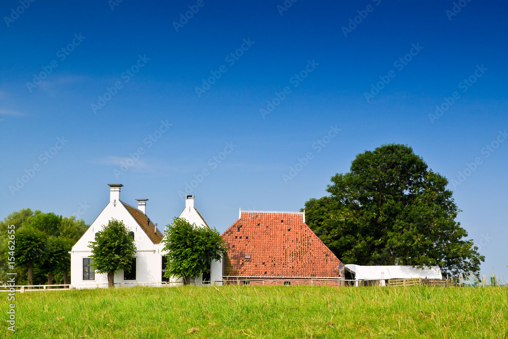 Countryside grassland with building  and road