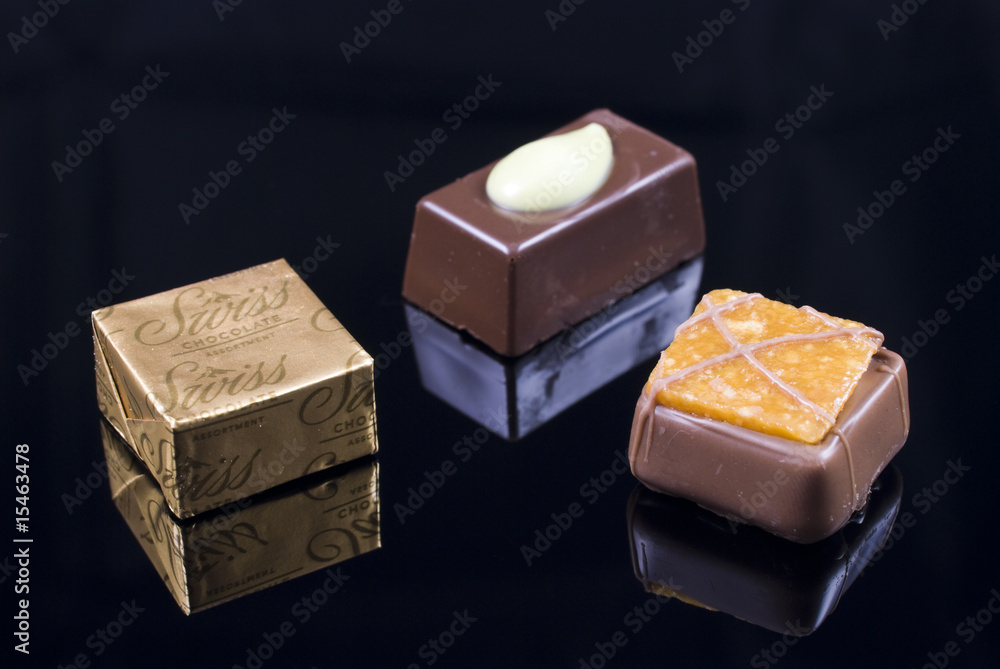 Selection of milk, dark and white chocolates Selection of milk, dark and white chocolates