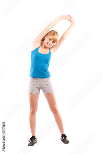 Blonde girl doing fitness, isolated on white