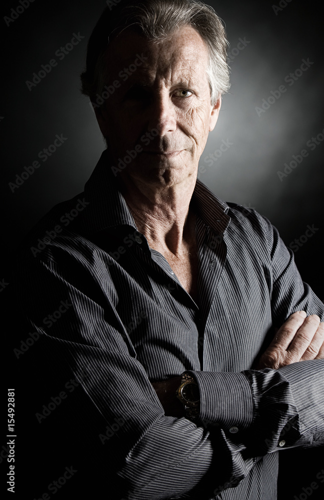 Fototapeta premium Low Key Shot of a Handsome Senior Man
