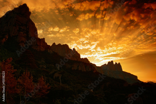Montserrat mountain sunset with rays
