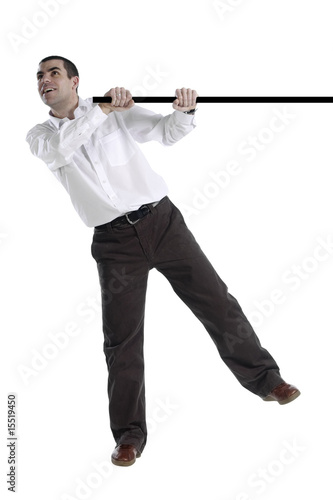 Isolated man swinging from black bar 2