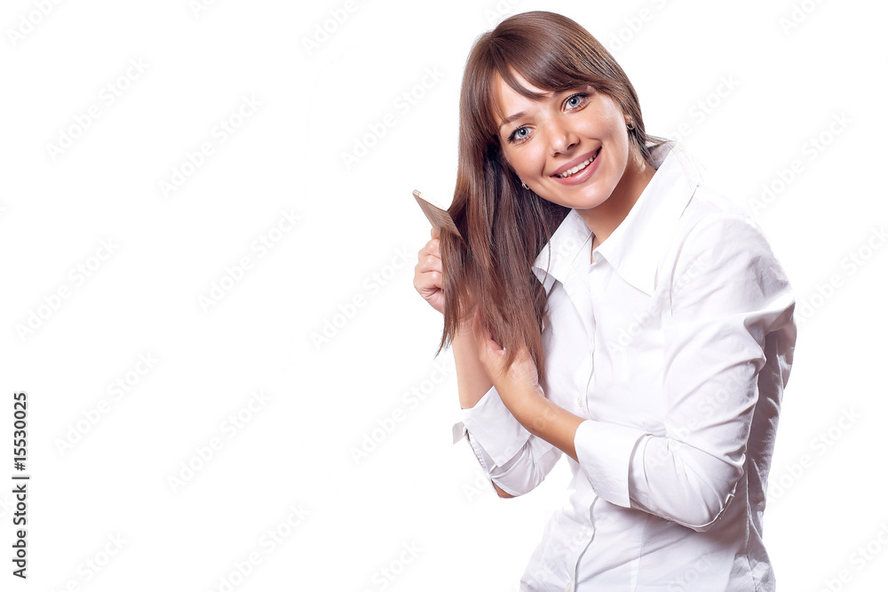Beautiful office brunette woman in white shirt with hairbrush Beautiful office brunette woman in white shirt with hairbrush